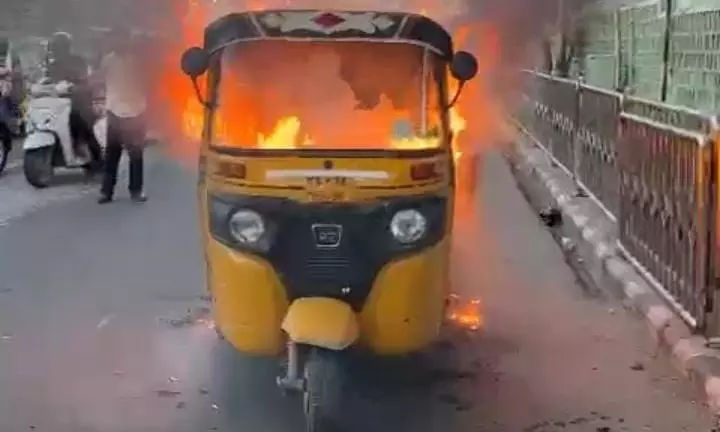 Distressed Auto Driver Set His Auto On Fire In Front Of Praja Bhavan