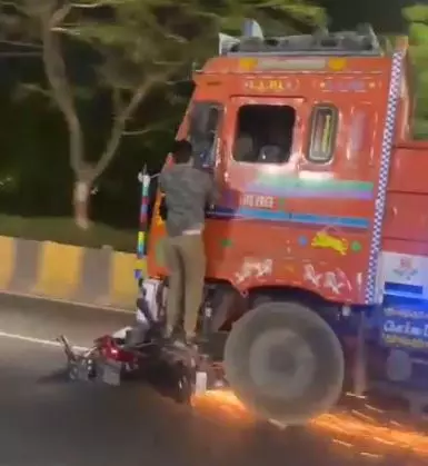 Two trucks catch fire after collision, driver injured on NH 63