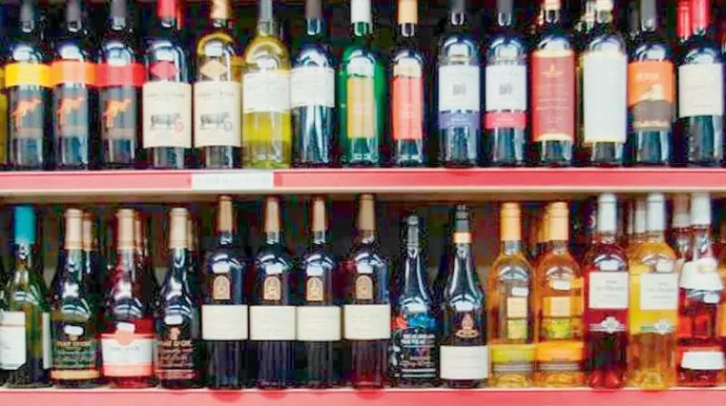 SI Caught on Video Raiding Illegal Liquor Shop in Borabanda