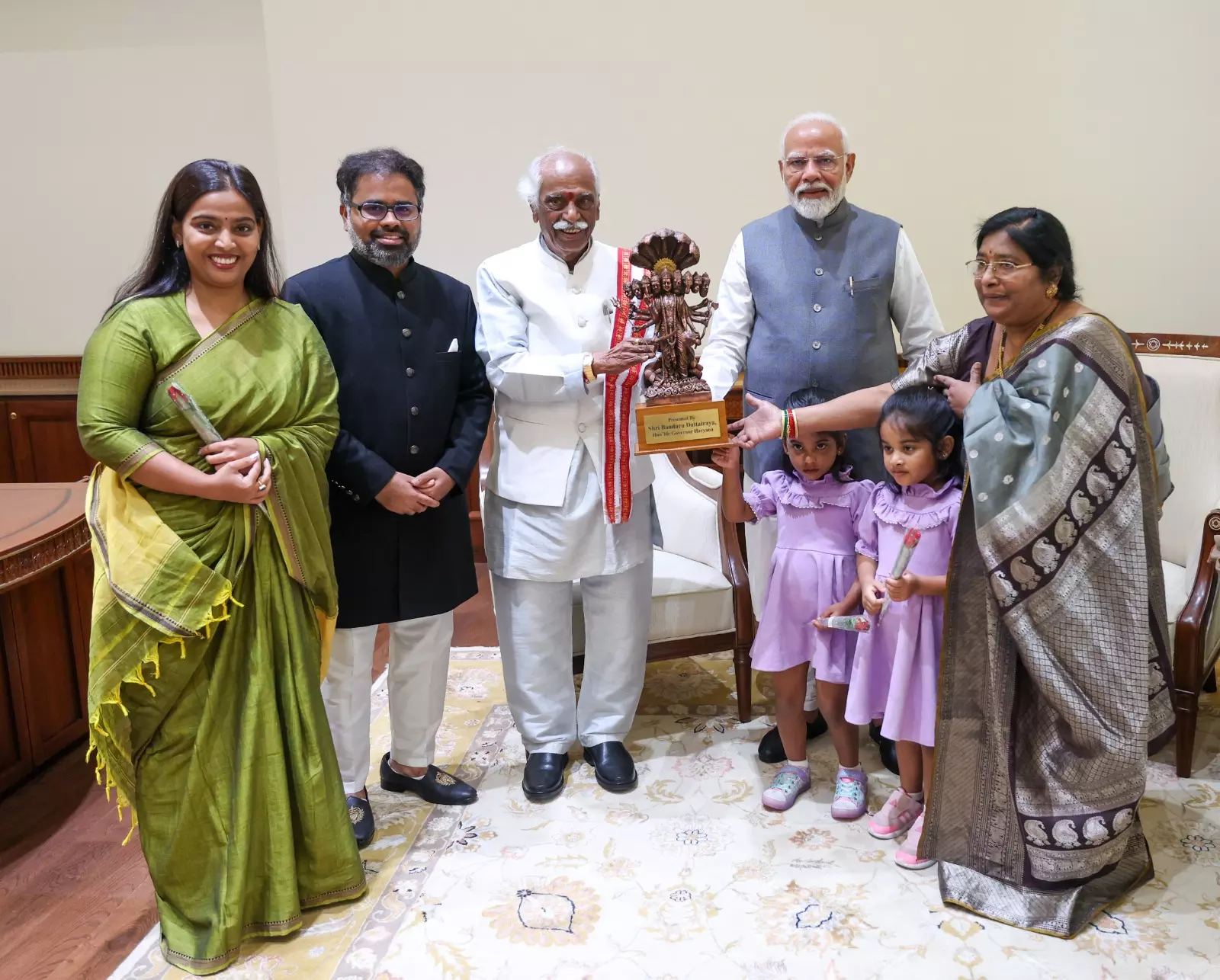 Haryana Governor along with family calls on PM