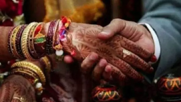 AP: Two wives celebrate husband’s third wedding