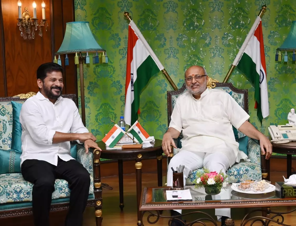 CM Revanth Reddy meets Governor Radhakrishnan at Raj Bhavan