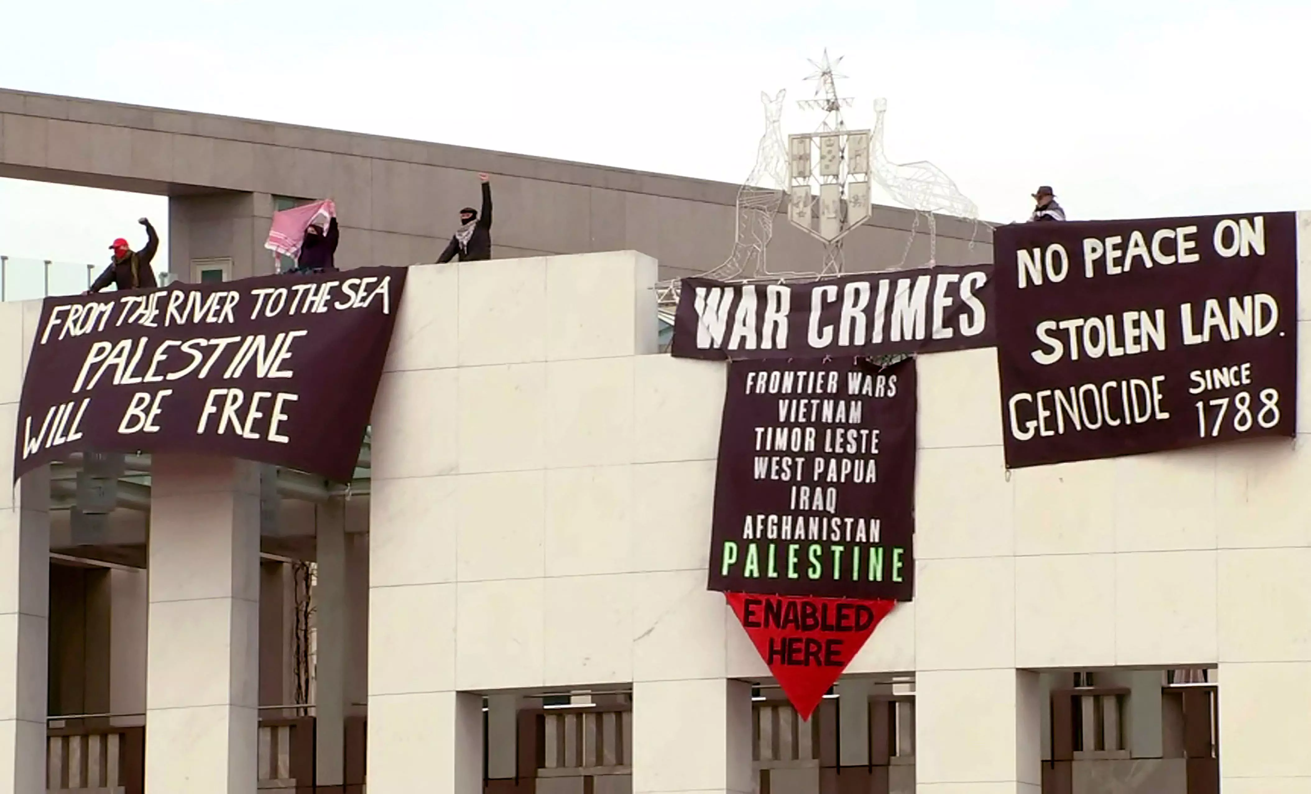 Pro-Palestinian protesters breach security at Australias Parliament House to unfurl banners