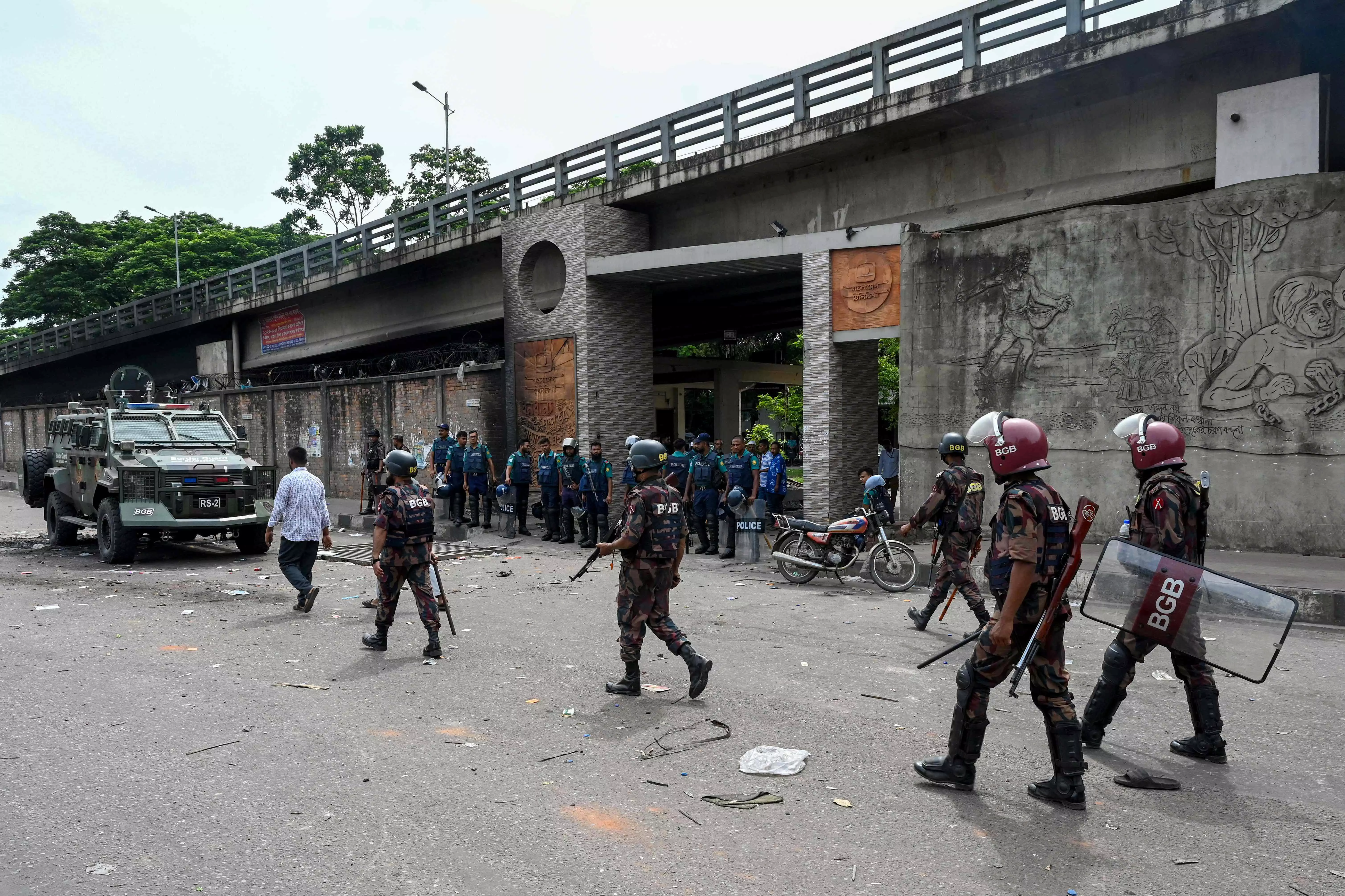 245 Indians return home as Bangladesh reels under deadly clashes