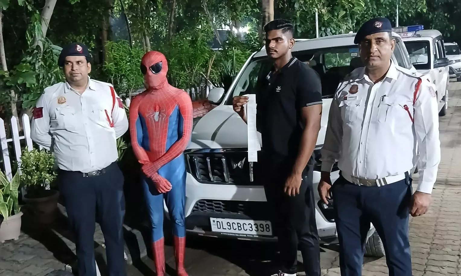 Man Dressed as Spiderman Fined For Riding on Cars Bonnet in Delhi