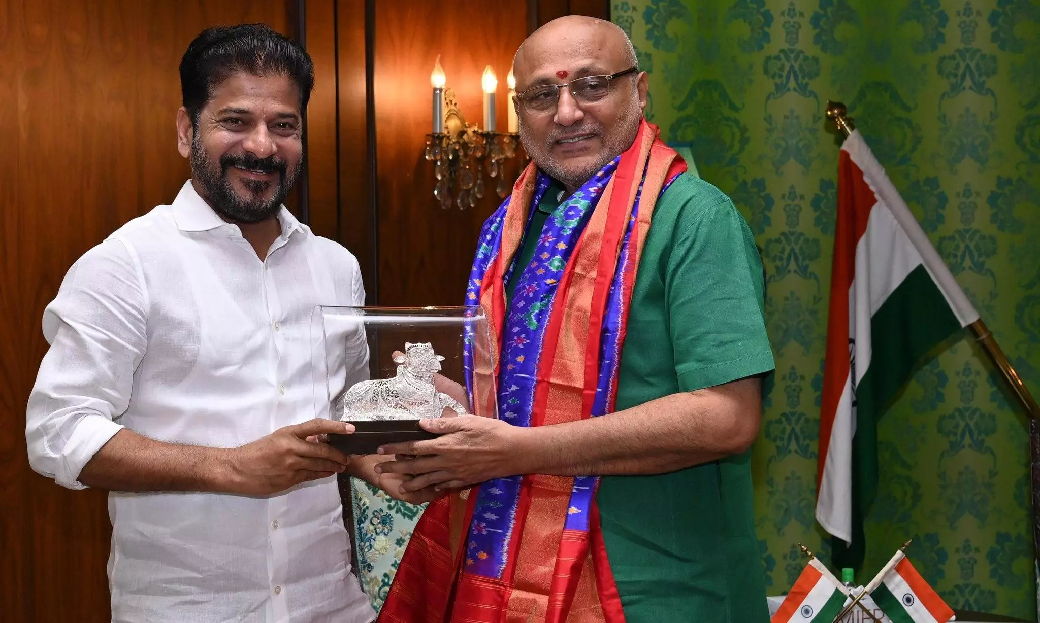 CM Revanth Reddy meets outgoing Governor CP Radhakrishnan