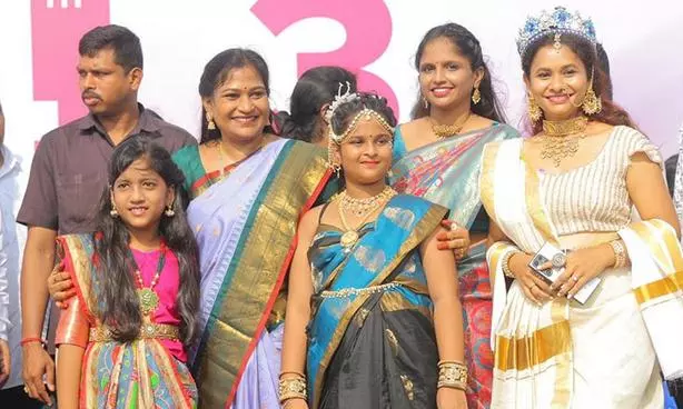 AP Minister Anita Leads Saree Walk on Vizag Beach Road