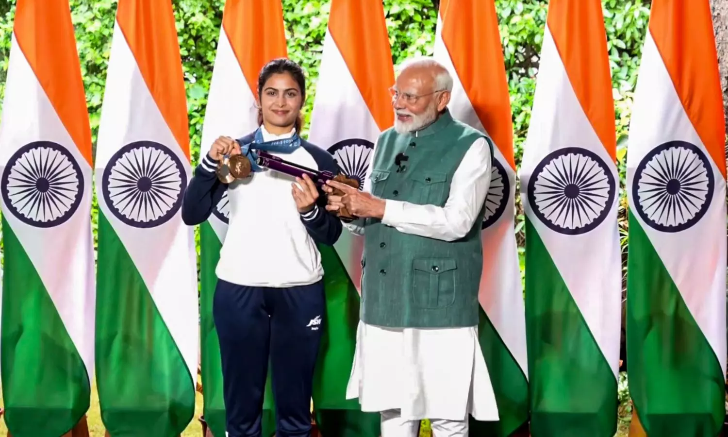 Bhaker explains about pistol, hockey team presents signed stick as PM meets Olympics contingent