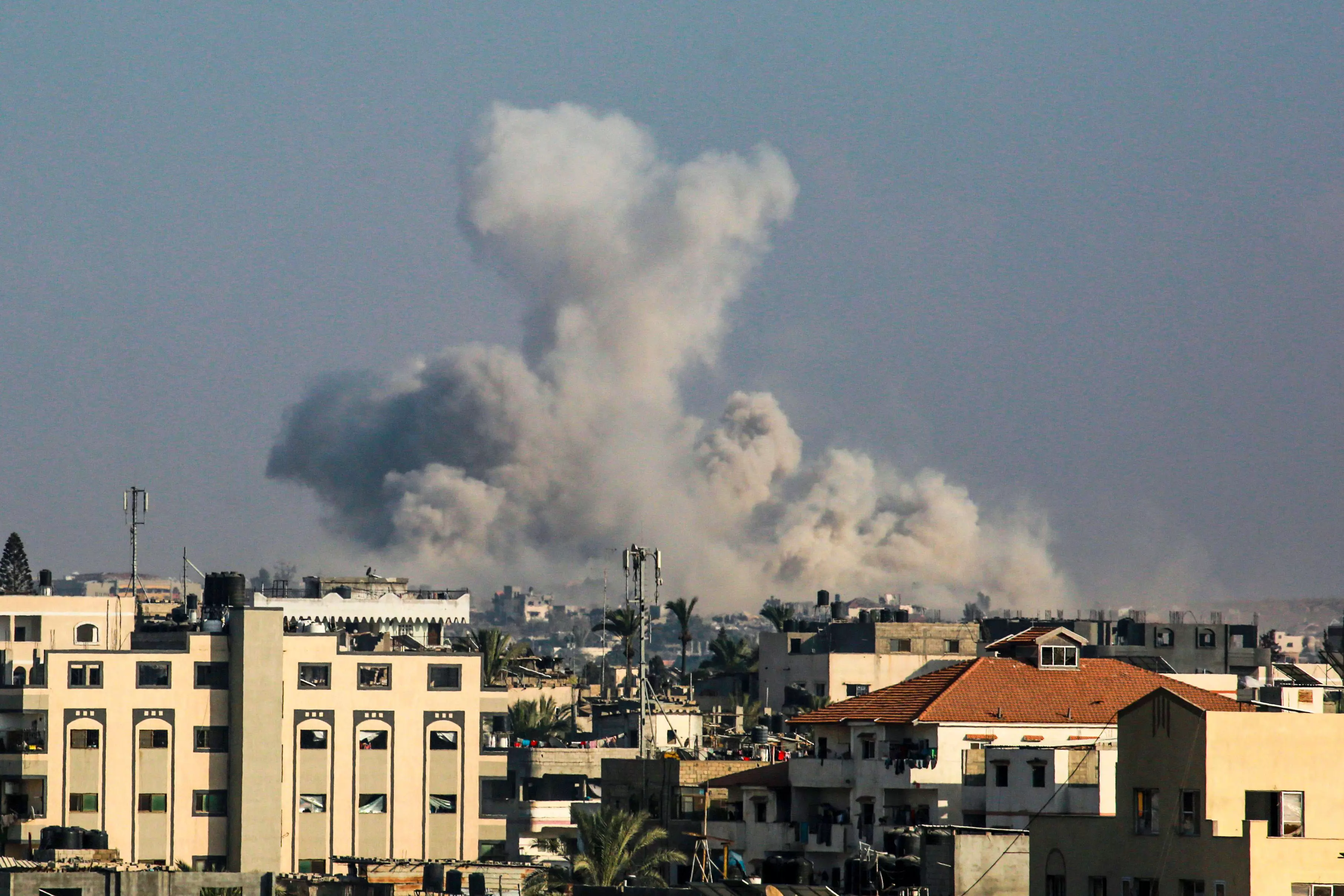 Israeli airstrike kills 18 members of a family in Gaza as mediators hope for a cease-fire