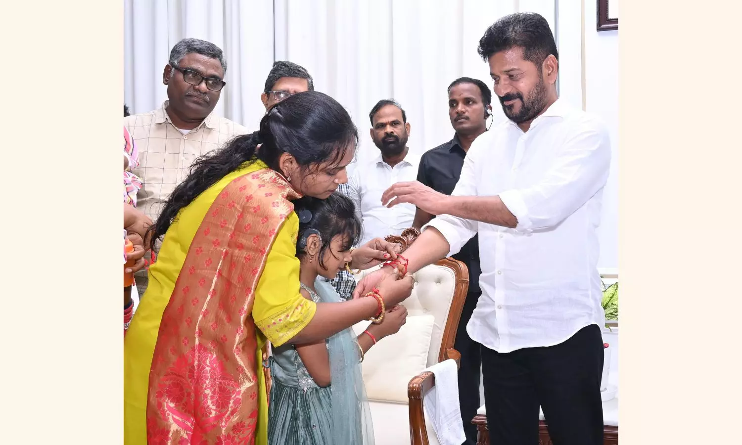 Kids Tie Rakhi to CM Revanth Reddy