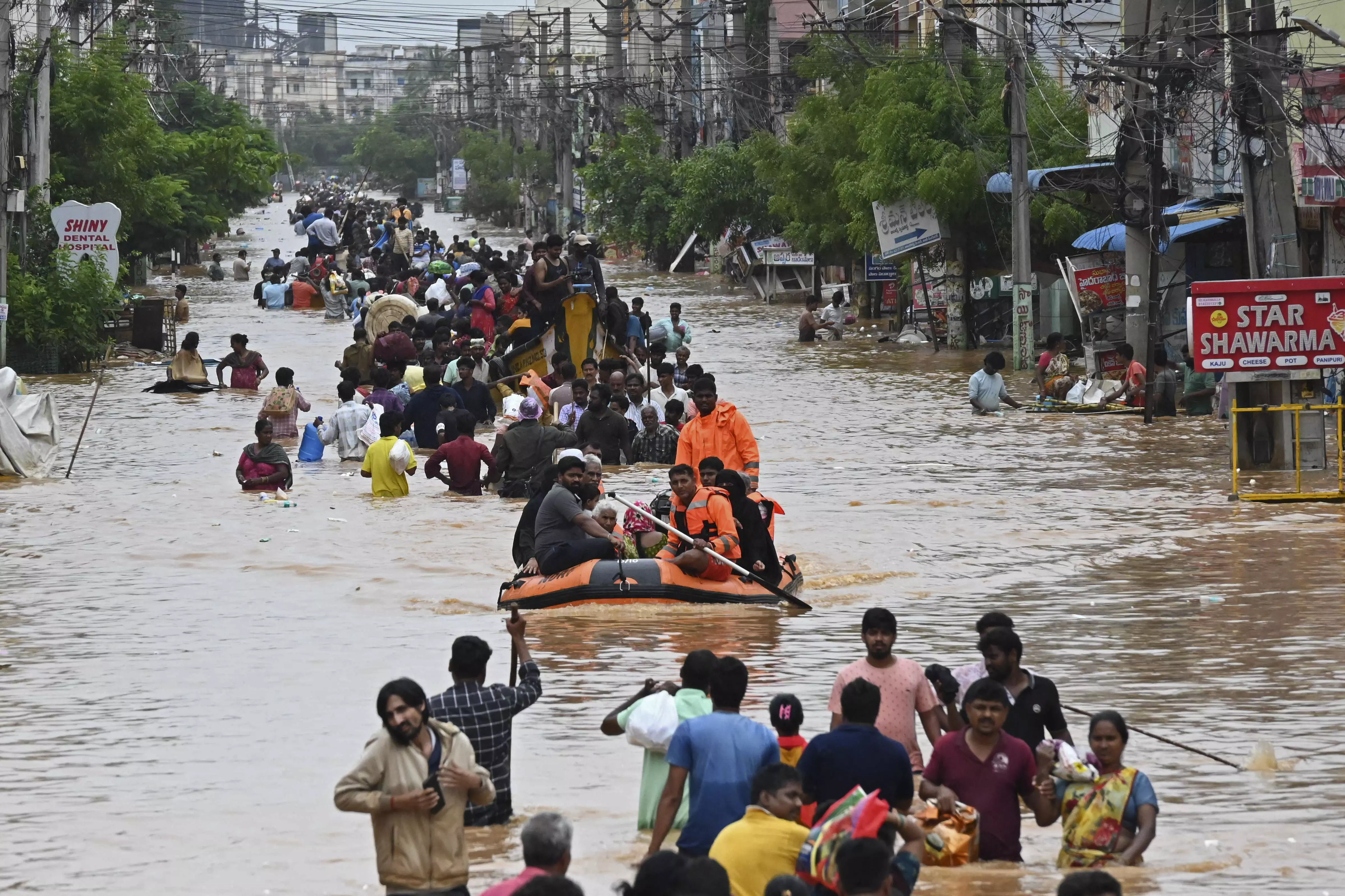 Nellore MPs Donate Rs 1.5 Crore for AP, Telangana Flood Relief