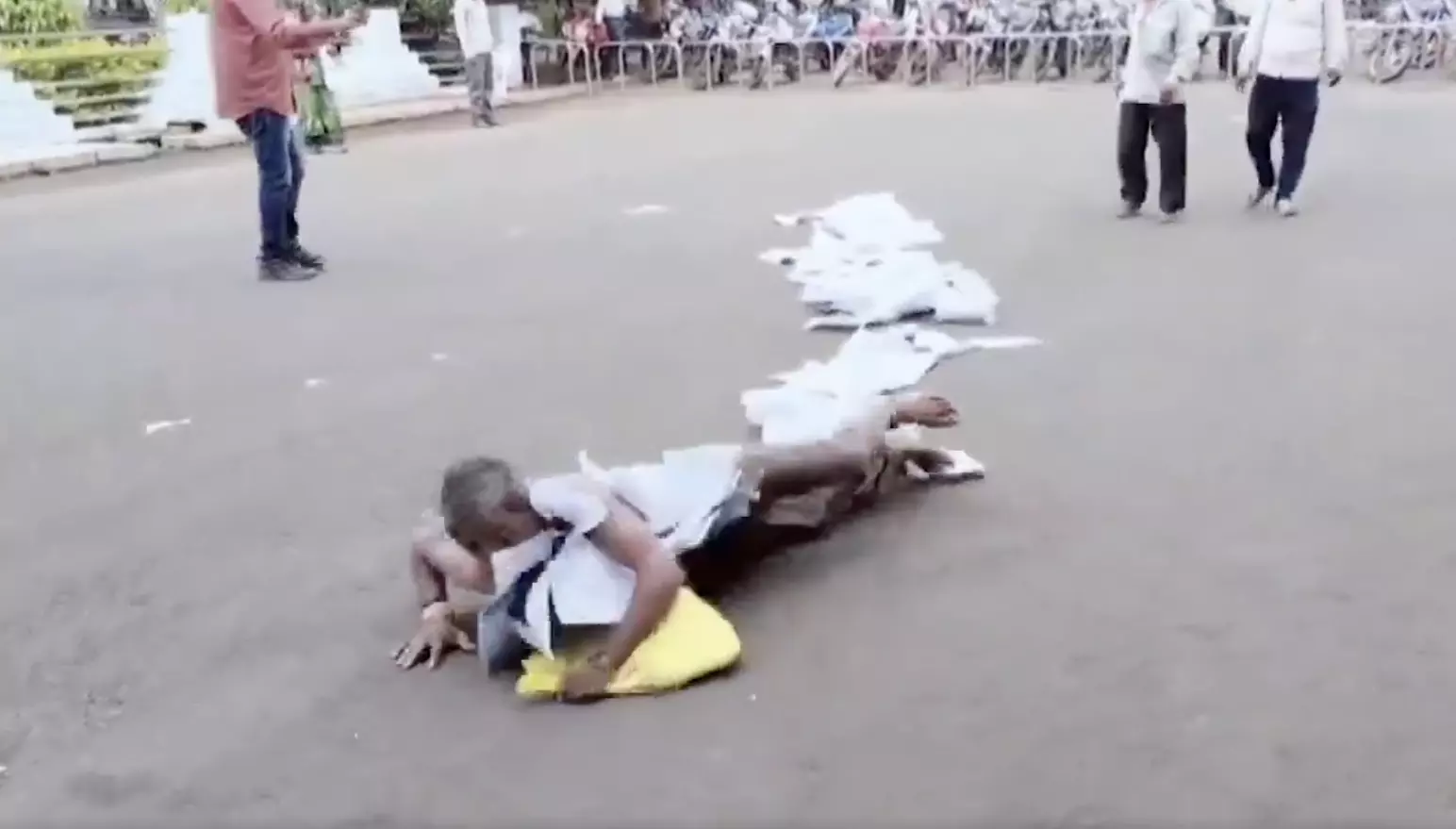 Madhya Pradesh: Man rolls on road, with documents wrapped around neck, to highlight demand, video goes viral