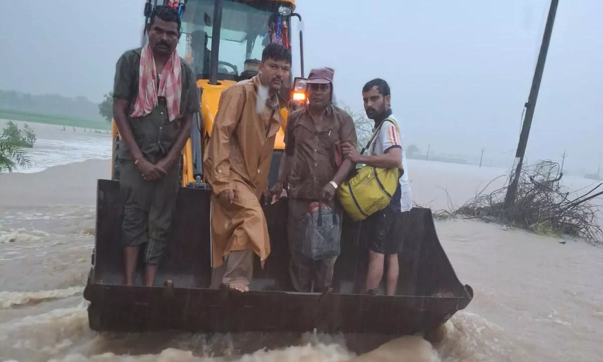 Unsung Heroes Brave Floods and Save Villagers in Mahabubabad District