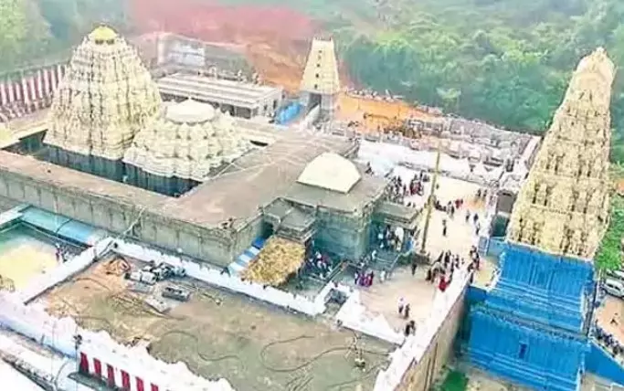 Swarna Pushparchana with 108 gold Sampangi flowers offered at Simhachalam