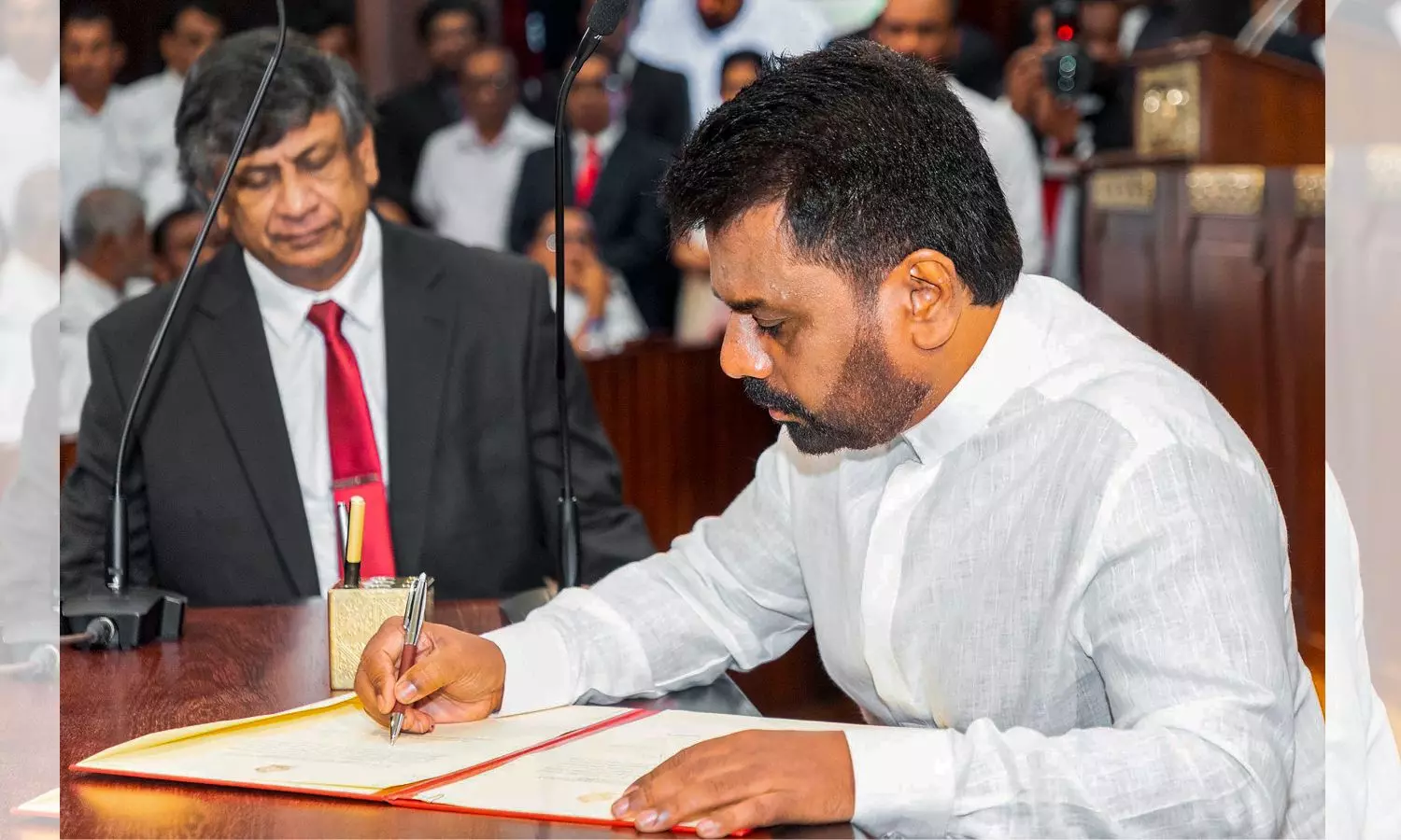 Sri Lankas new president appoints cabinet ahead of expected snap polls