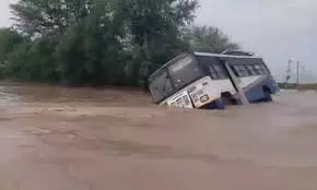 RTC bus trapped in stream in Prakasam