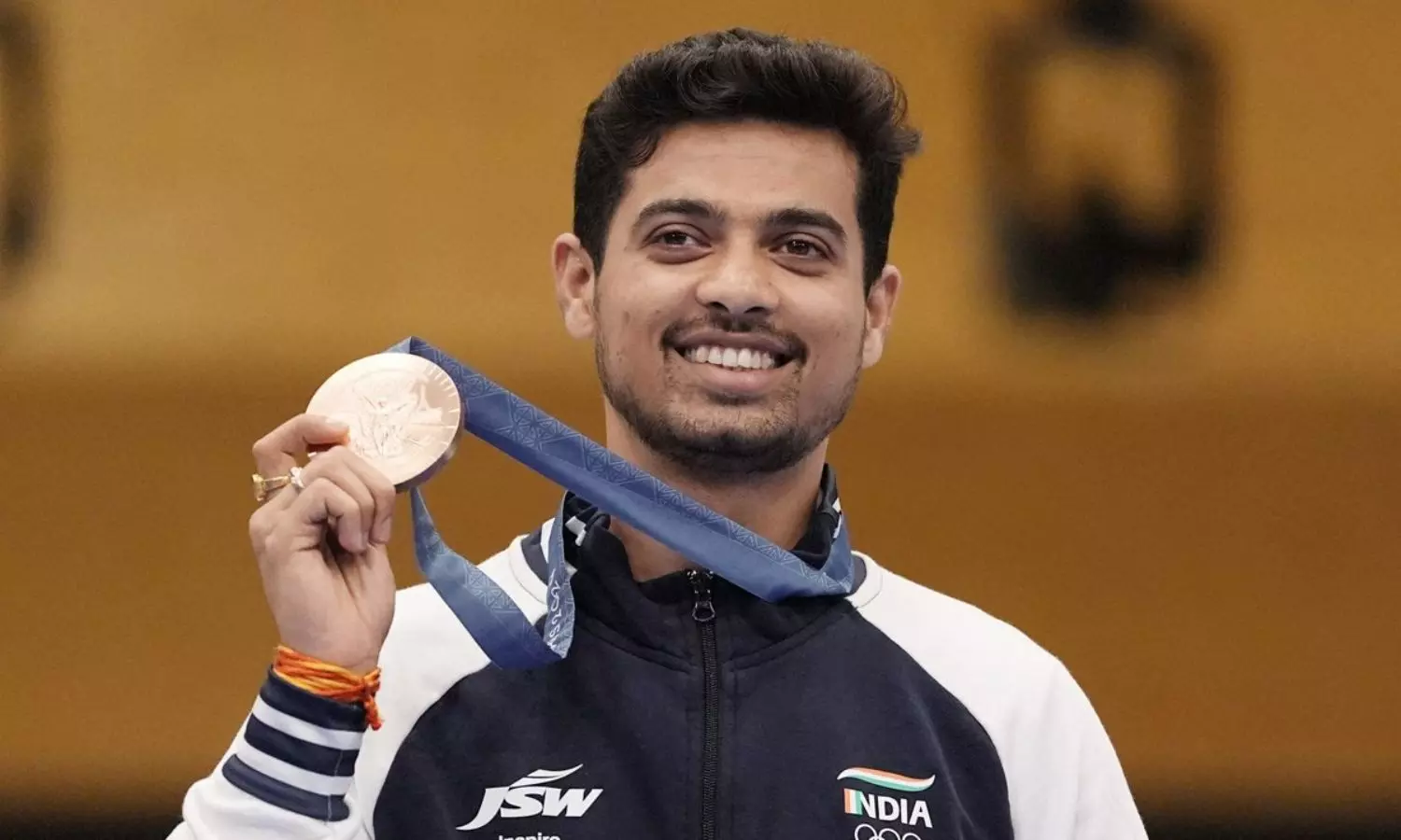 My son should get Rs 5 cr prize money, flat in Pune, says Olympic medallist Swapnils father