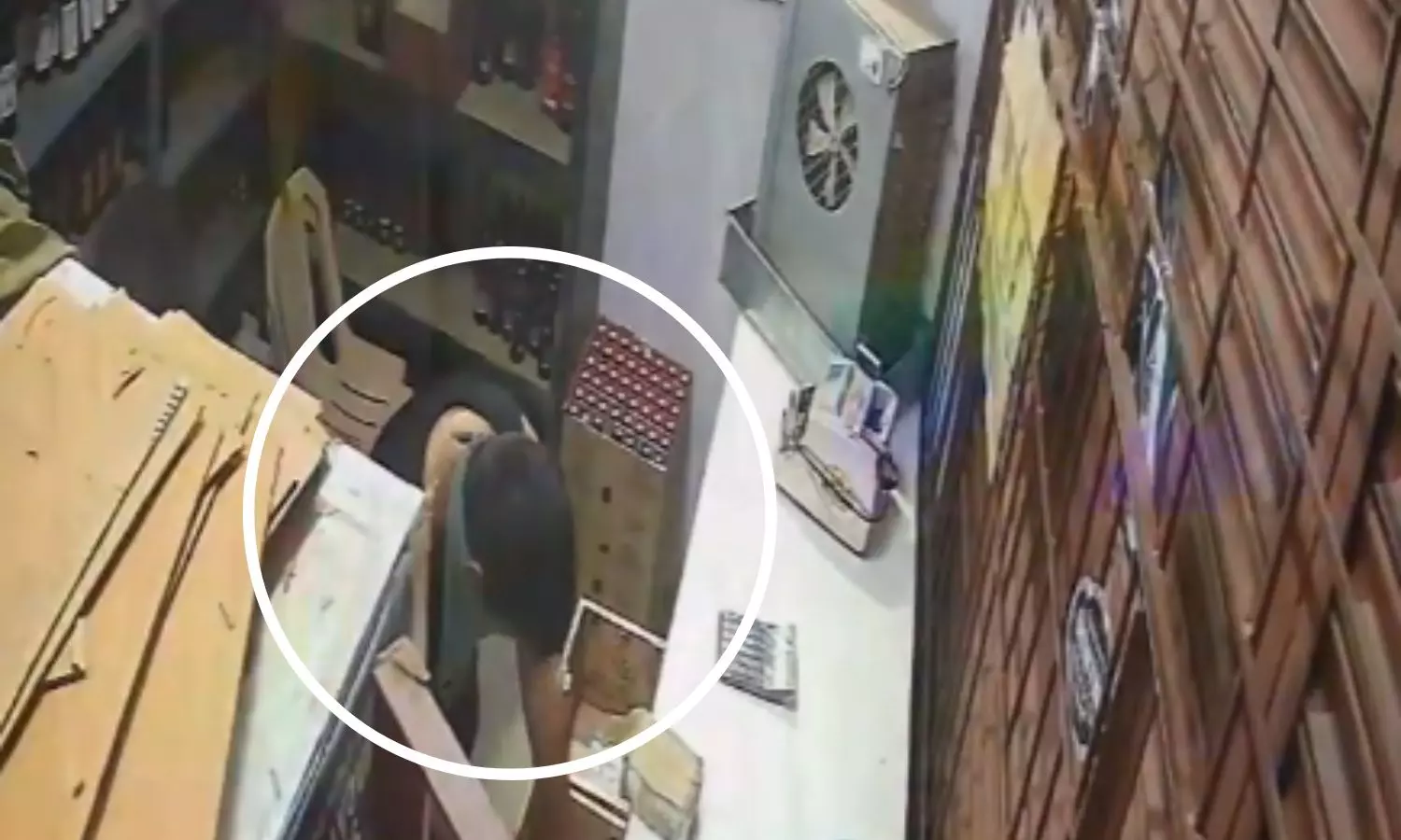 CCTV Shows Masked Man Stole 12 lakhs from wine shop in Nalgonda