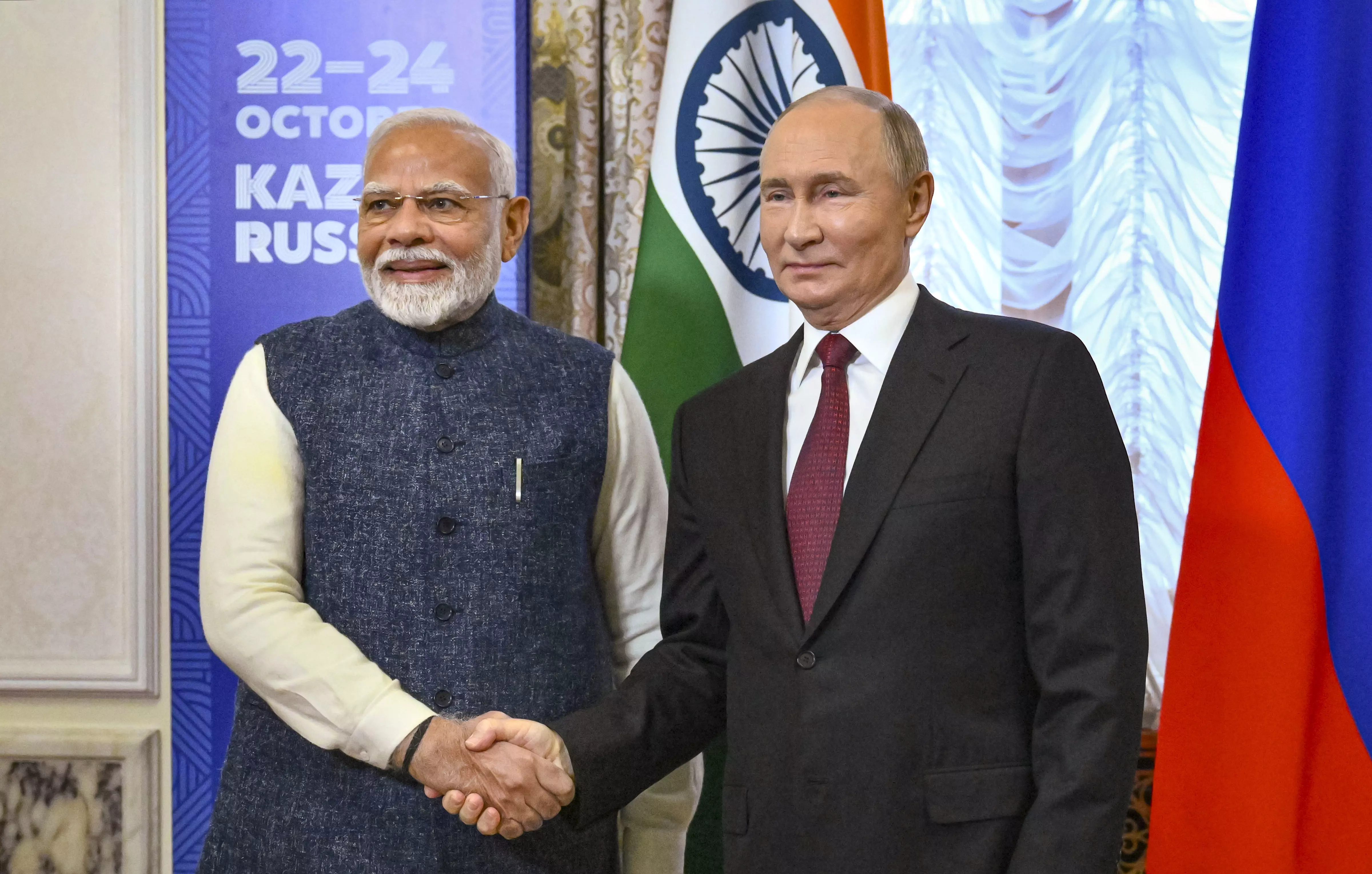 Problems must be settled peacefully: Modi to Putin