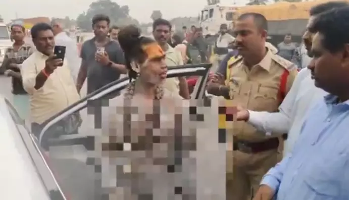 Female Aghori Naga Sadhu causes uproar at Nakkapalli Toll-gate