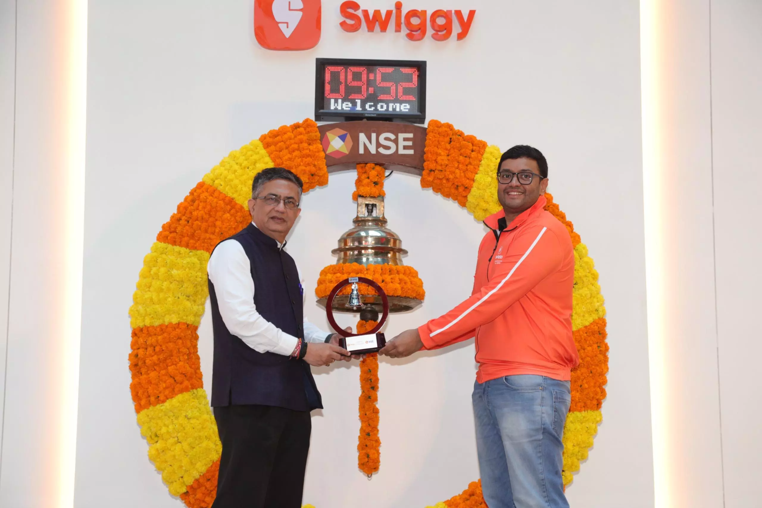 Swiggy shares surge nearly 8 pc in market debut