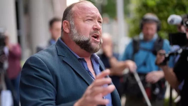 Satire publication The Onion buys Alex Jones Infowars at auction with Sandy Hook families backing