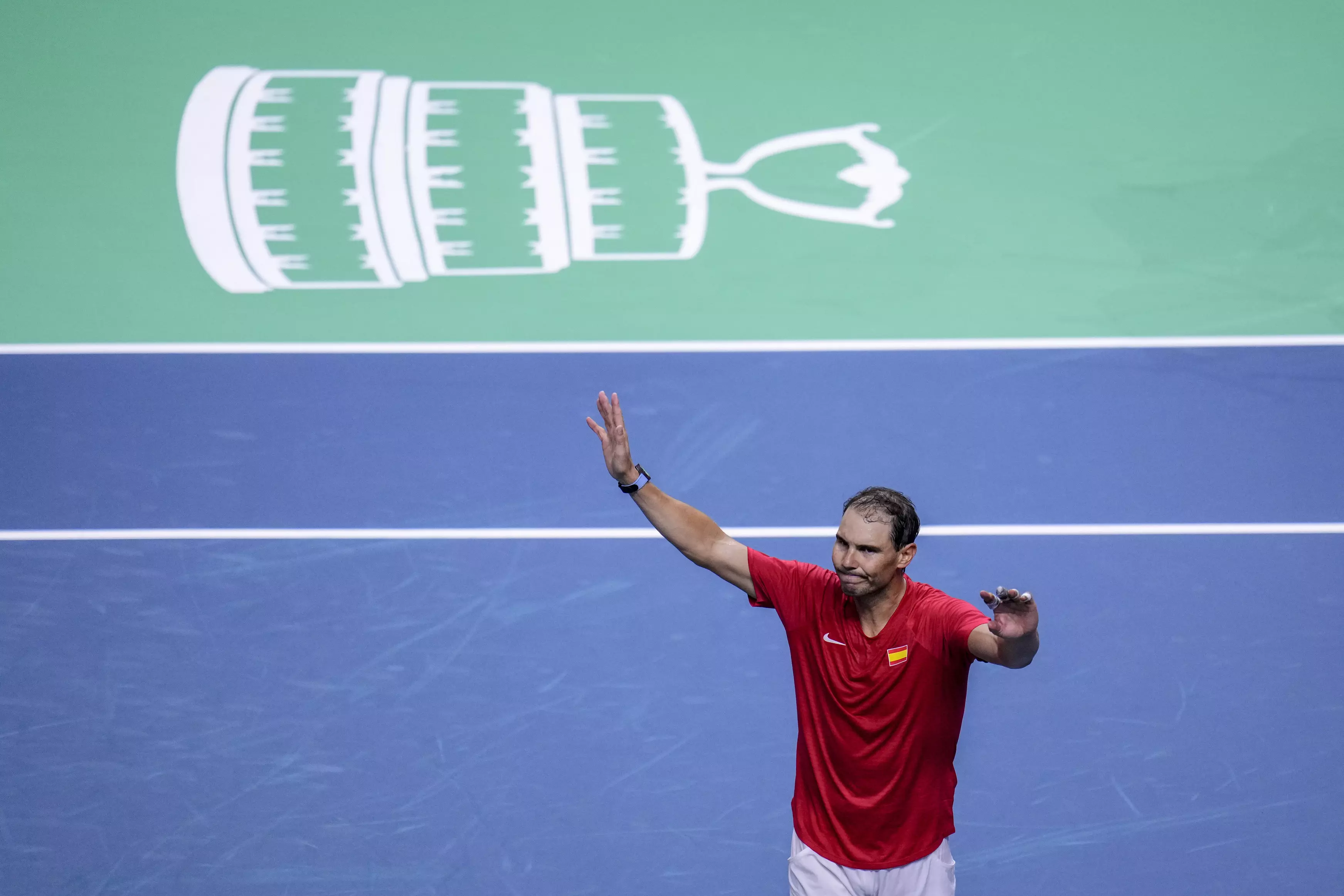 An emotional Rafael Nadal retires at the Davis Cup after he loses and Spain is eliminated