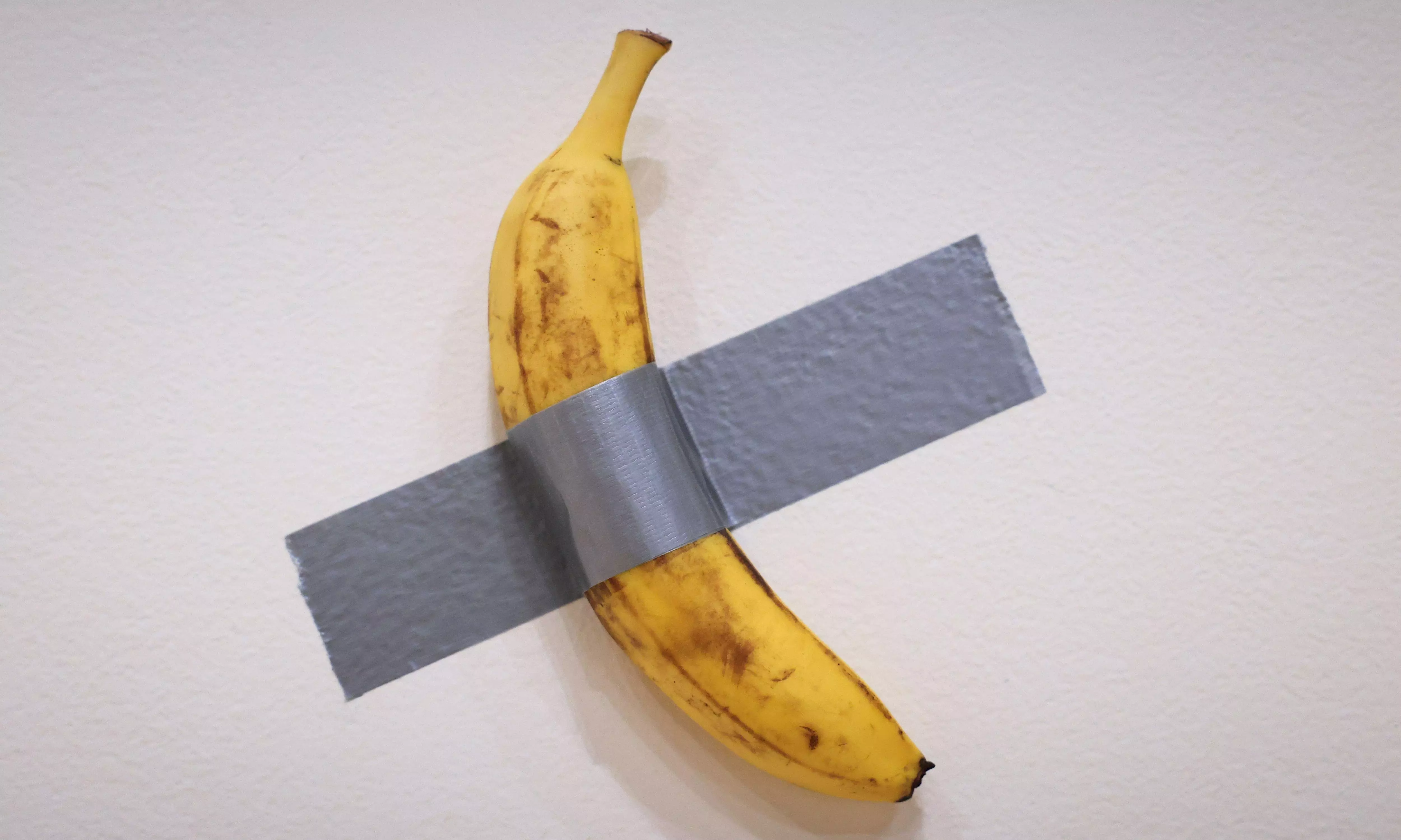 Banana taped to a wall sells for $6.2 million in New York