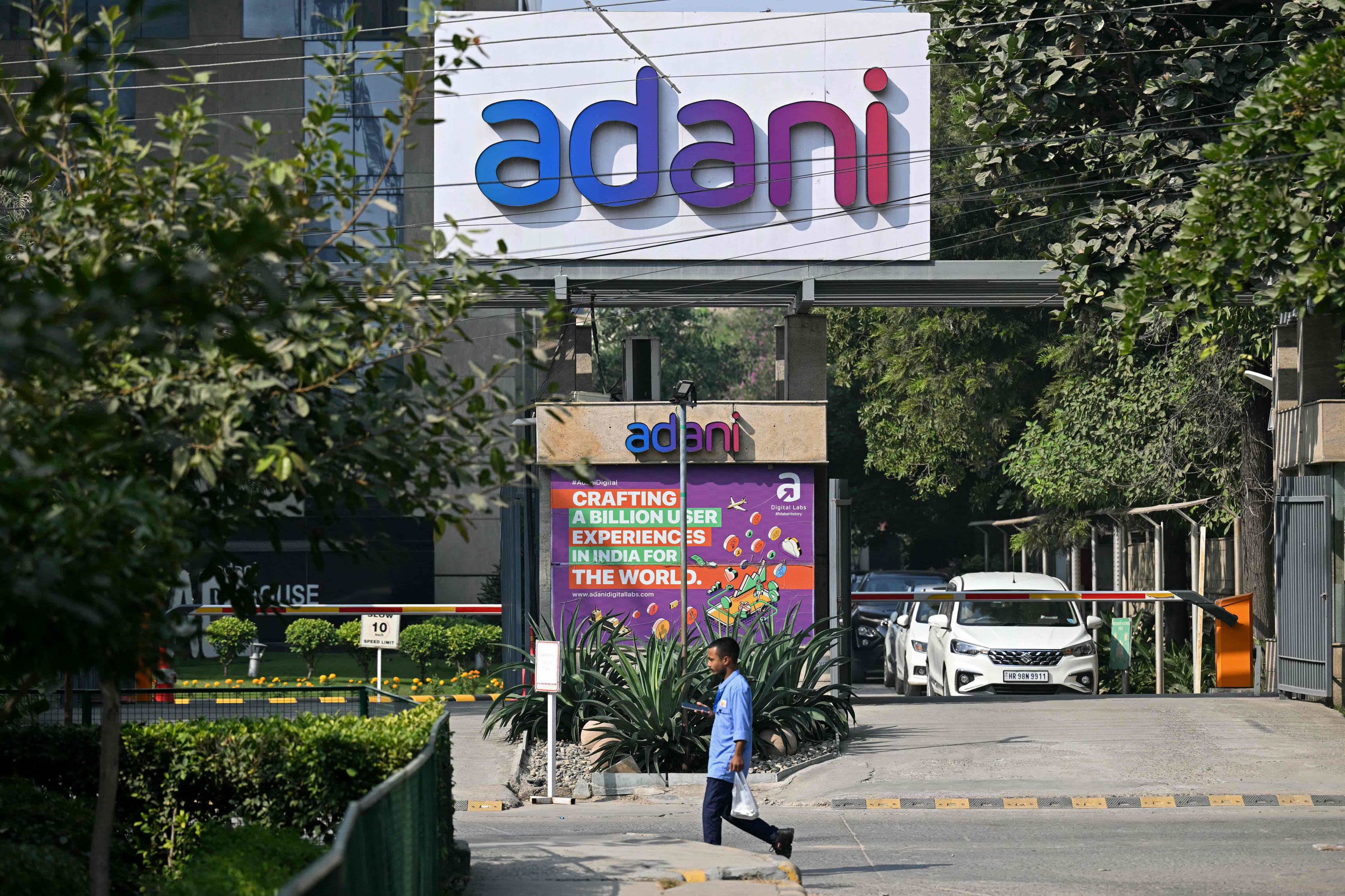 Nine Adani Group firms trade higher; Adani Total soars nearly 19%