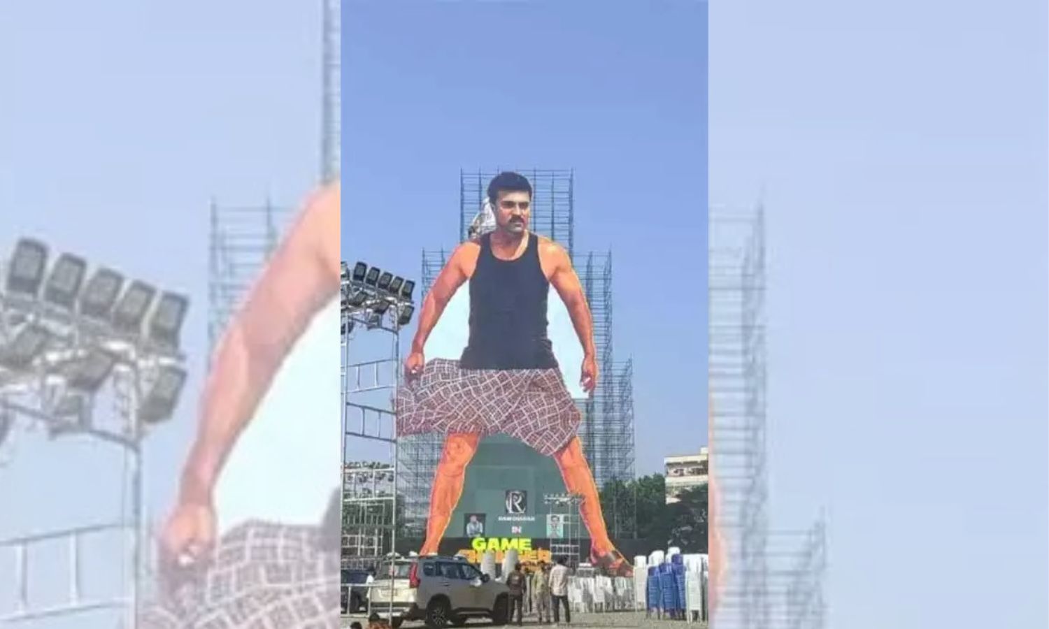 Game Changer: Ram Charan's Huge Cutout Unveiled in Vijayawada