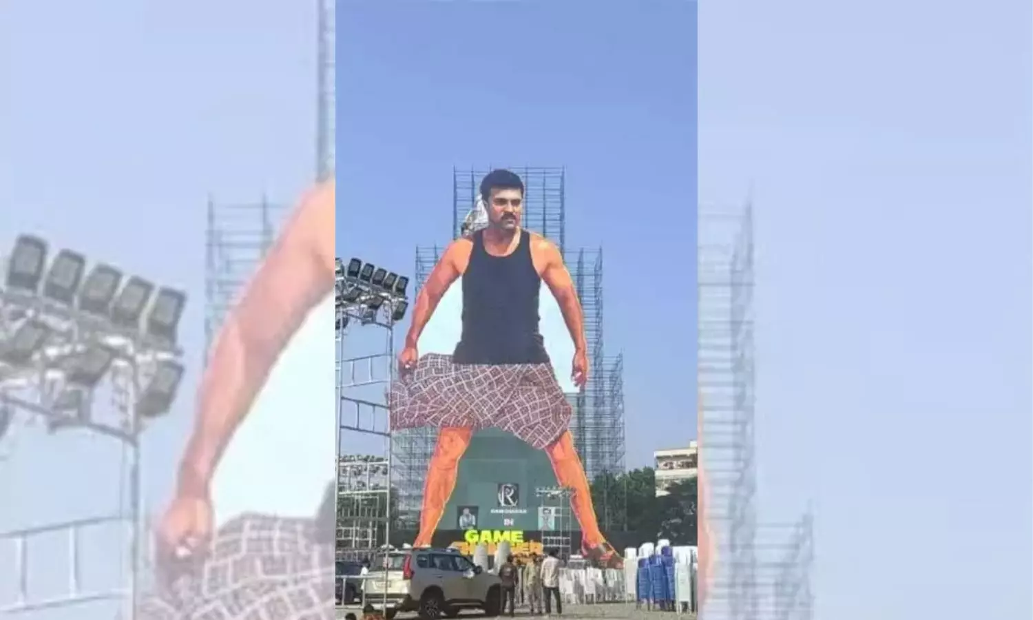 Game Changer: Ram Charans Huge Cutout Unveiled in Vijayawada