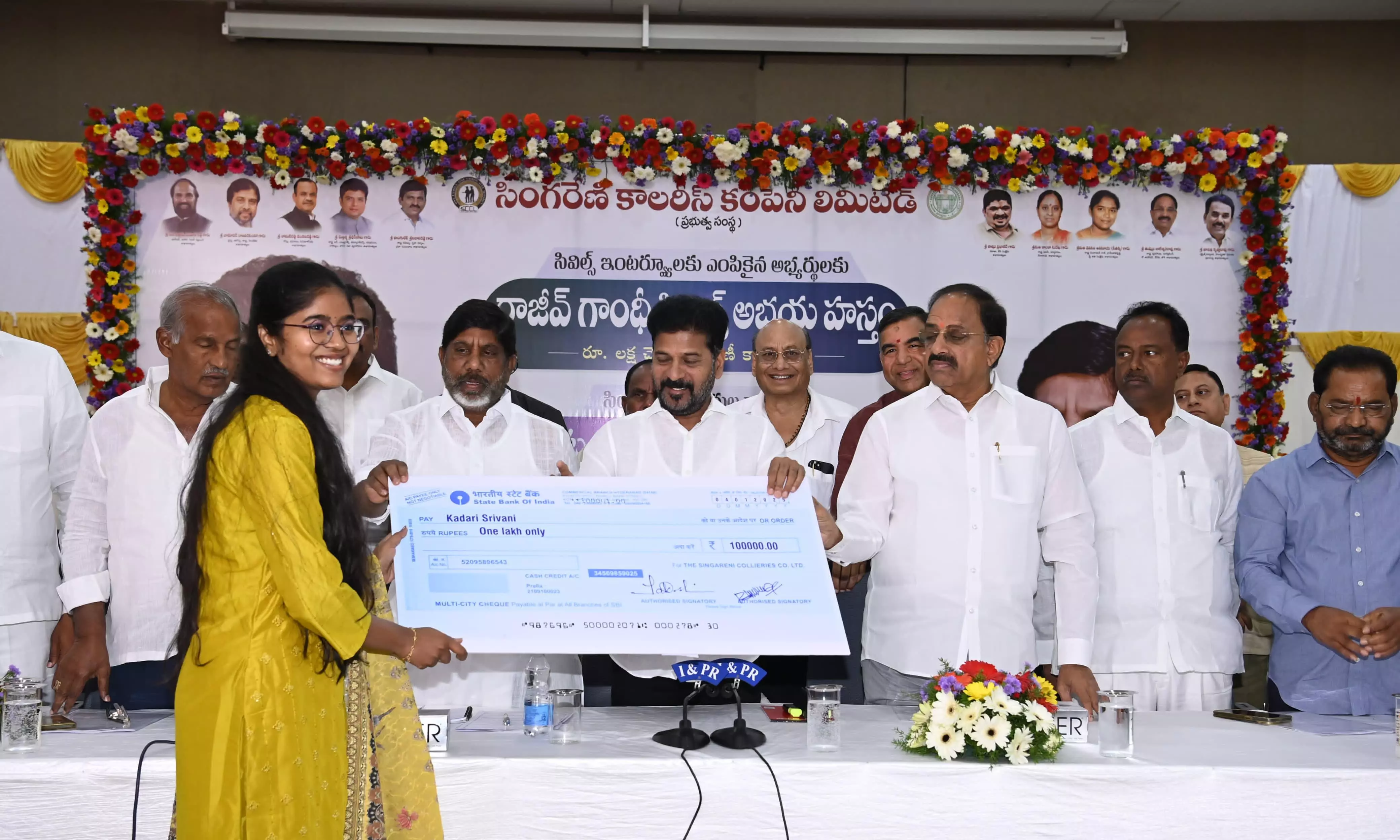 CM Distributes Cheques to TG Civil Services Aspirants