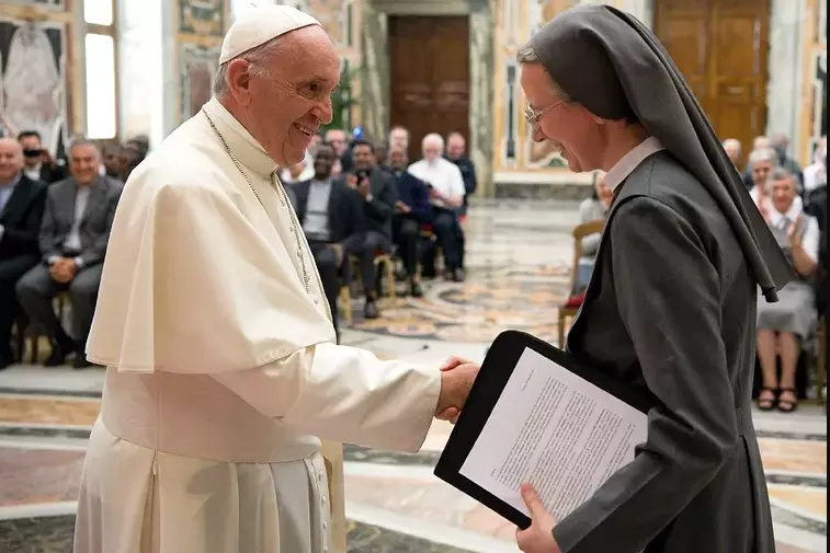 Pope appoints first woman to lead major Vatican office