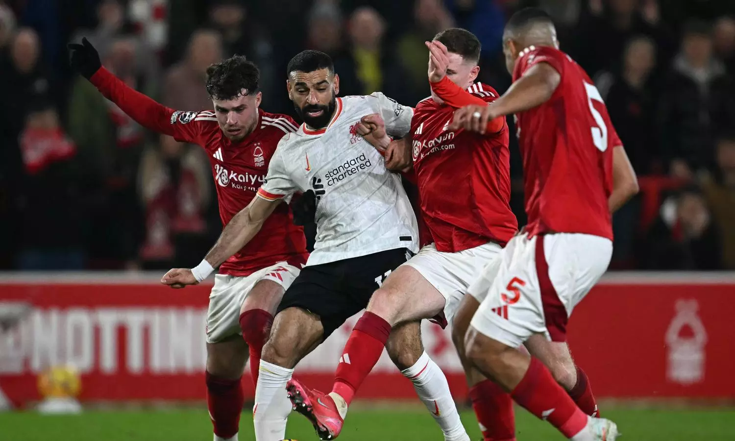 Liverpool frustrated by Forest, Man City blow late lead at Brentford