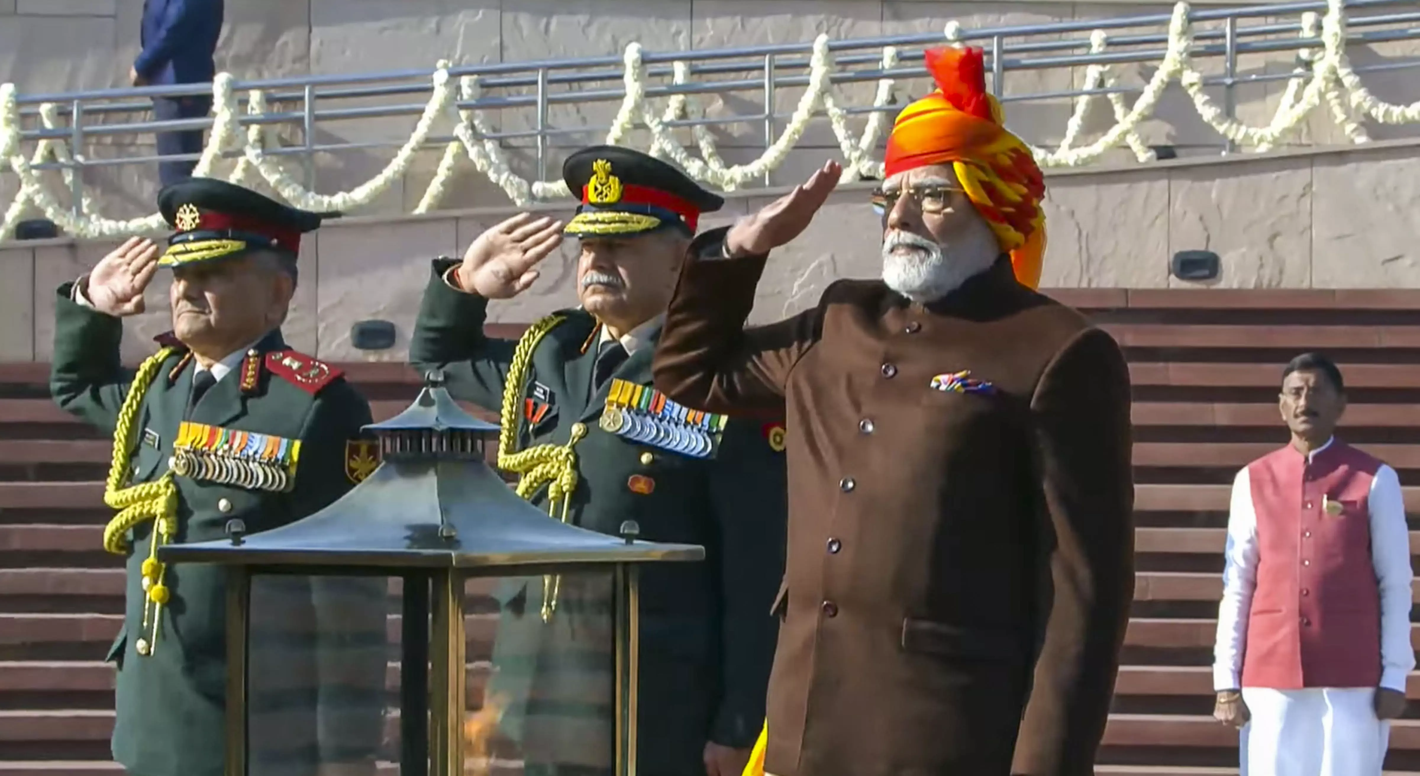 PM Modi dons vibrant multi-coloured turban with bandhgala coat on R-Day